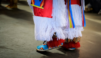 Indigenous dancer at a PowWow