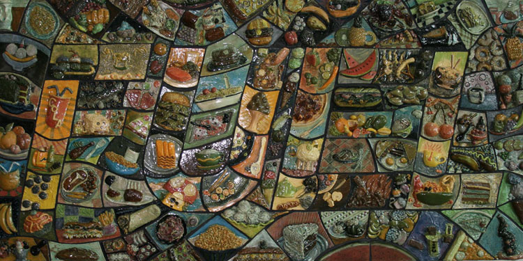 Colorful mosiac tiles that spell the word Fuel. Each tile consists of a food item.