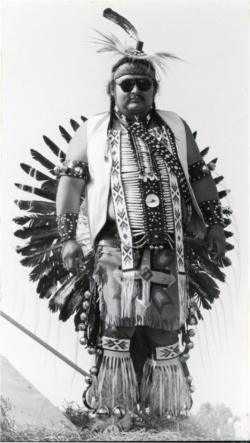Wesley Lyle Keewatin Richards, DSL, in traditional First Nations regalia acting as the Indigenous liaison officer for the Red Deer and District Museum, Red Deer, Alberta.jpg