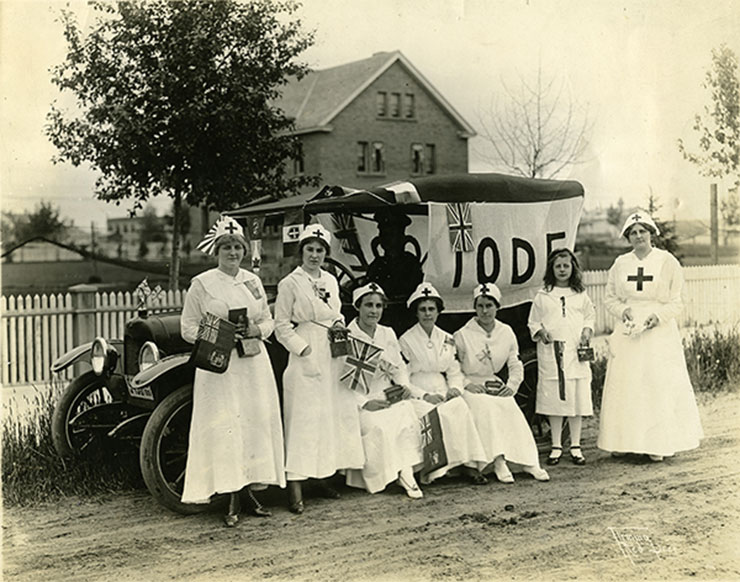 Red Deer Archives, P2129; Red Cross nurses with an IODE banner, 1916