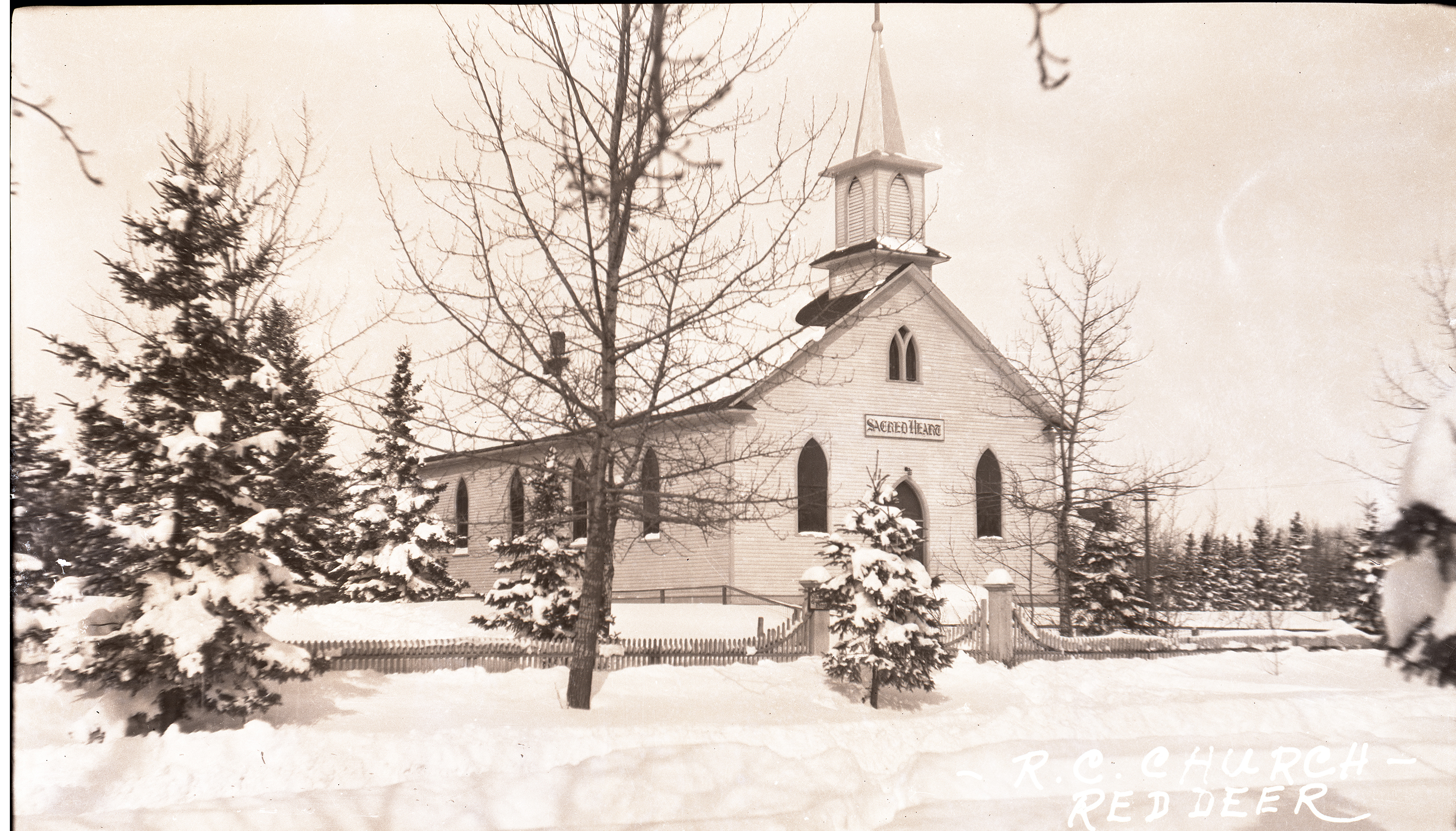 Black and white photo of Sacred Heart Roman Catholic church in Red Deer