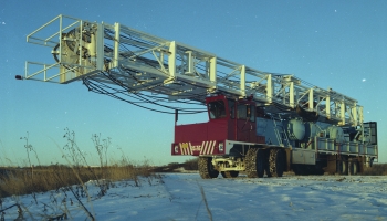 Colour photo of a mobile rig for an oil company during winter time