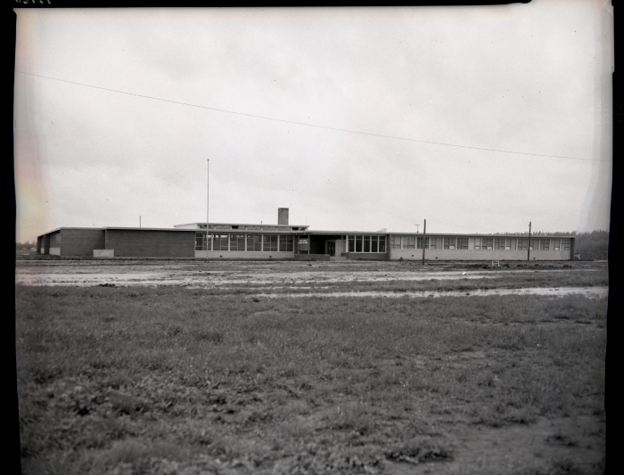 Black and white photo of the front of Lindsay Thurber Comprehensive High School