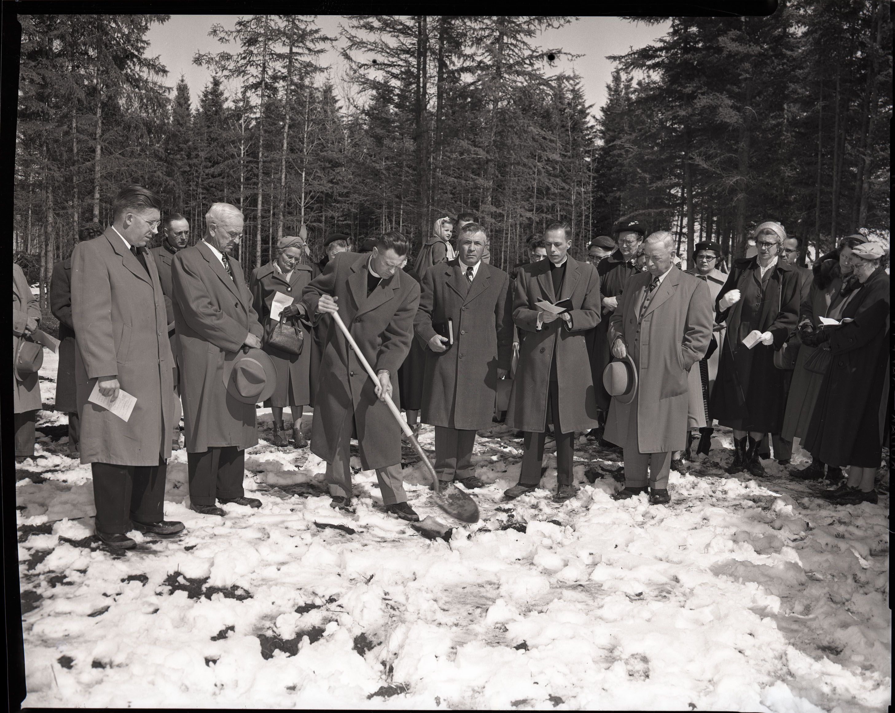 Black and white photo of participants at the sod turning ceremony for the United Lutheran Church,
