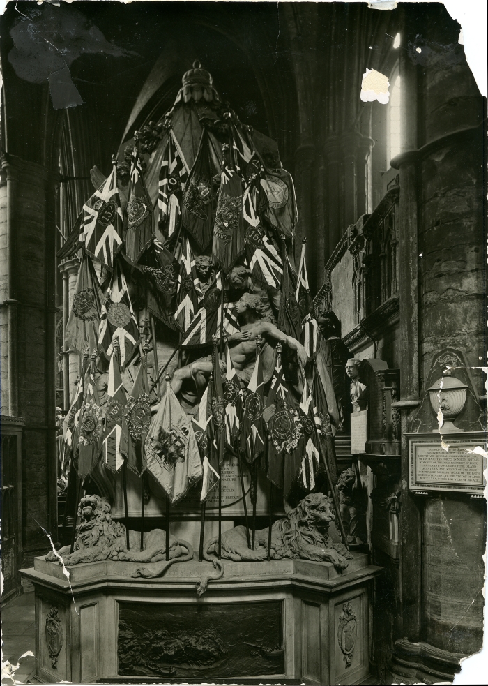Black and white photo of the 187th Battalion colours on display in Westminster Abbey, London, England