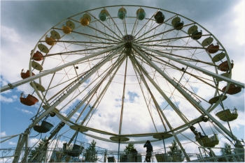 Coloured photo looking up at a ferris wheel ride at Westerner Days