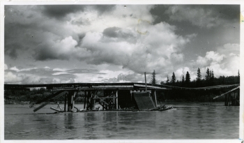 Black and white photo of the CNR bridge flood across the Red Deer River in 1943