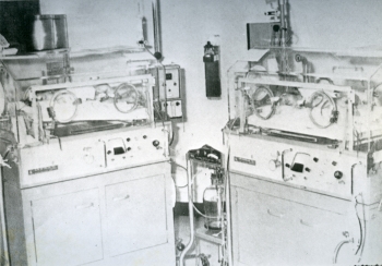 Black and white photo of two incubators each with a baby inside in the Red Deer Regional Hospital Centre