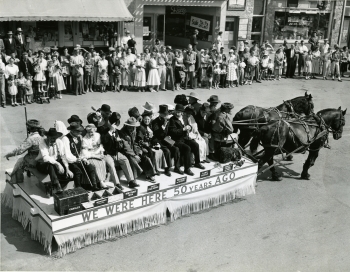Black and white photo of the Central Alberta Pioneers and Old Timers' Association parade float in the 1955 Red Deer Fair Parade
