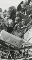 Red Deer Archives, P3787; Young boys and girls on a rollercoaster at the Westerner Exhibition Fair, 1968