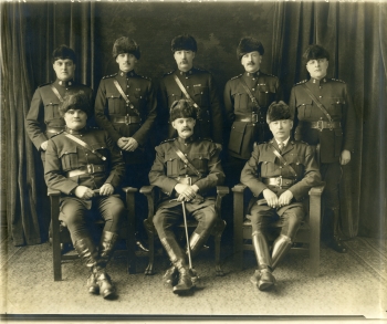 Black and white photo of the Red Deer Alberta Police in their full uniform with fur hats