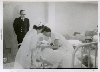 Black and white photo of nurses at the Red Deer General Hospital learning emergency evacuation drills