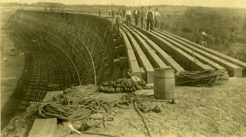 Black and white photo of workers building the Canadian National Railway trestle bridge at Burbank siding near Red Deer
