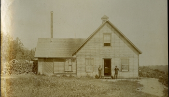 Black and white photo of a building, Trimble Creamery in Pine Lake, Alberta, in 1908
