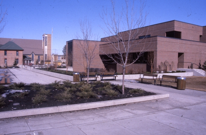 Coloured photo of the Snell Residence and the new Court House on 4909 48 Avenue