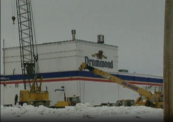 Screenshot of news clip featuring the exterior of the Drummond Brewery building