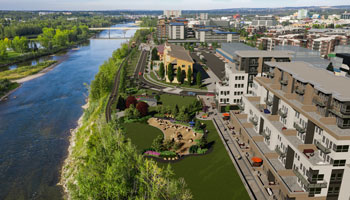 Mixed use area with multi-family buildings, businesses and parks along the river