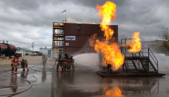 Firefighters working at the fire training facility