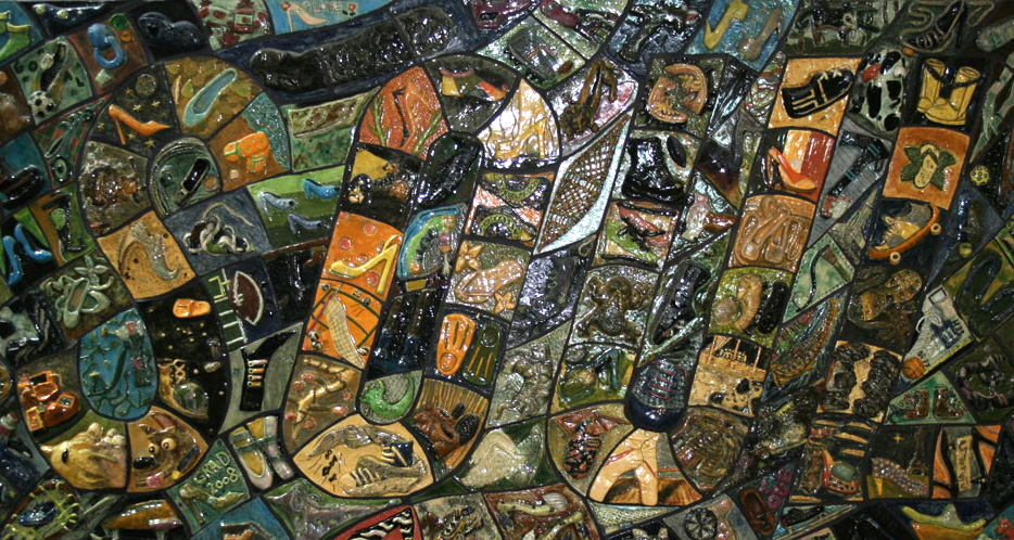 Colorful tiles that form the word Soul. Each tile depicts an image of a piece of footwear.